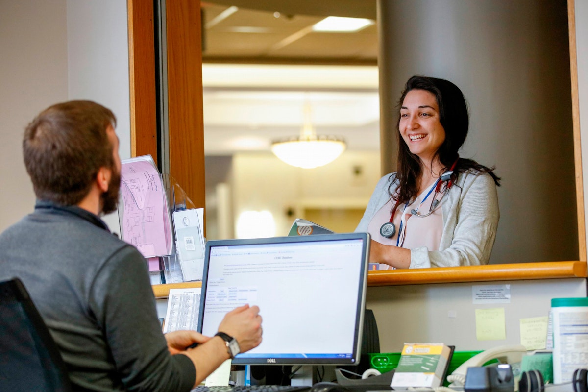 UR Nursing student at the CERC desk